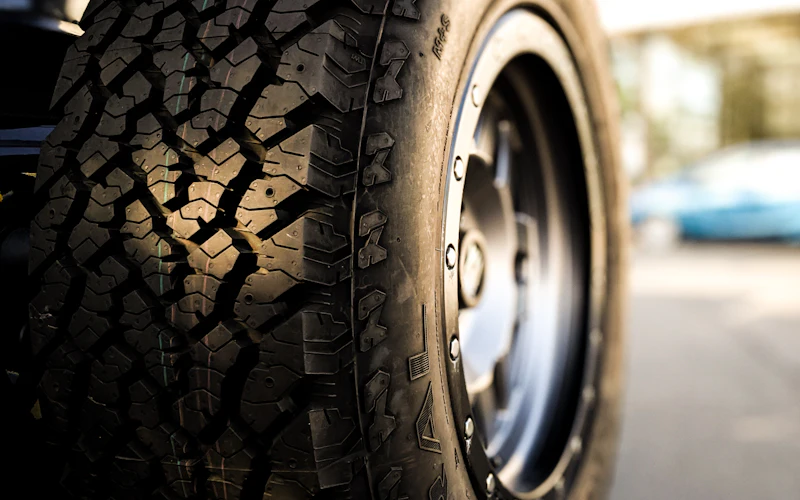 Close-up of a car tire and wheel